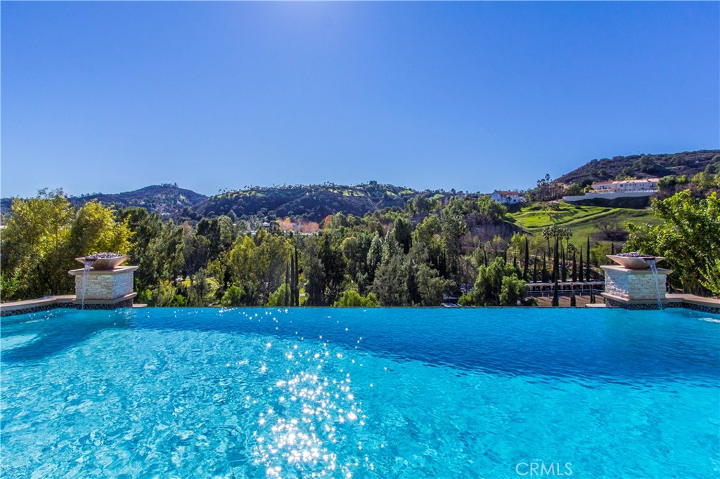 24100 Hidden Ridge Road Hidden Hills, CA 91302 - Photo 3 of 15 a view of a garden