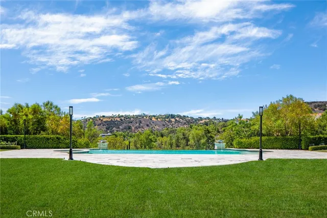 a view of a golf course with a lake