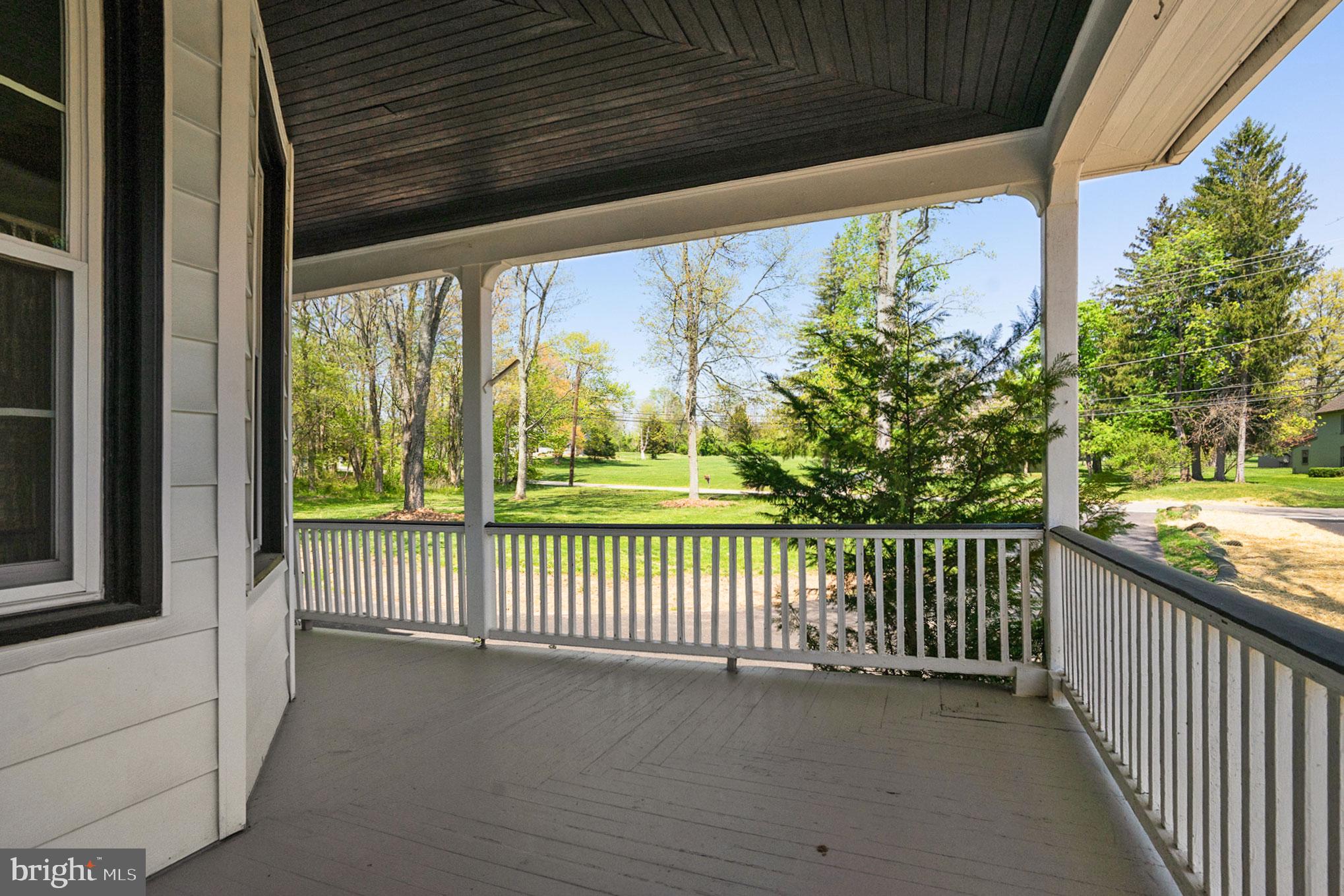 1870 Yost Road Blue Bell, PA 19422 - Photo 43 of 50 Wrap around porch view to front yard