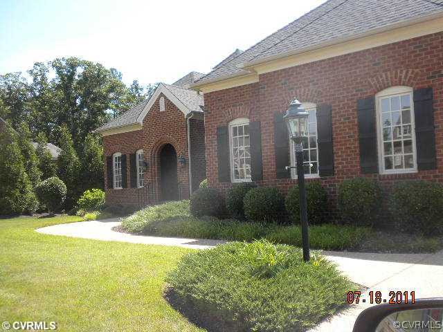 516 Hunt Field Road Manakin-Sabot, VA 23103 - Photo 1 of 9 a front view of a house with a yard