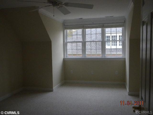 516 Hunt Field Road Manakin-Sabot, VA 23103 - Photo 8 of 9 an empty room with a window