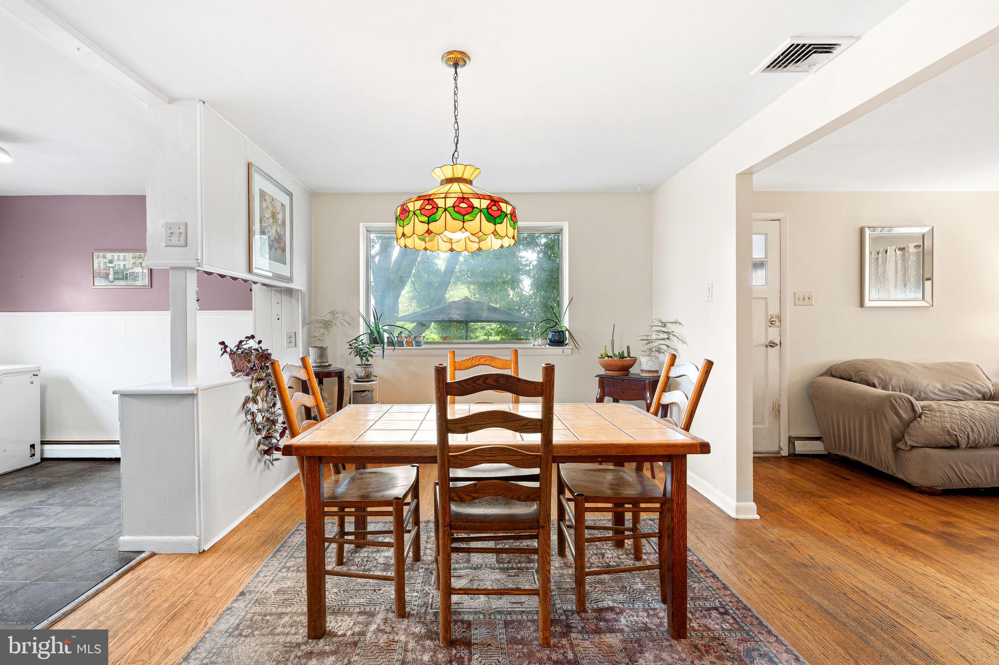 2 Waverly Road Havertown, PA 19083 - Photo 4 of 30 a view of a dining room with furniture wooden floor and chandelier