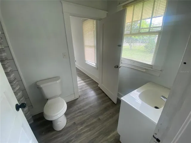 a bathroom with a sink and a toilet