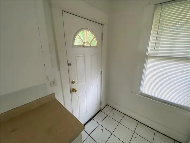 an empty room with windows