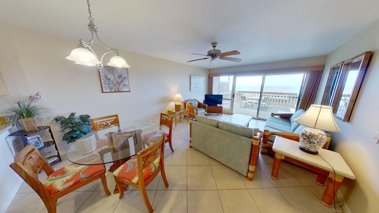 a room with furniture and a chandelier