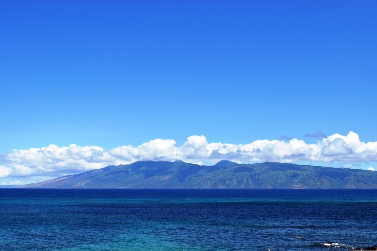 4909 Lower Honoapiilani Road, Unit E4 Lahaina, HI 96761 - Photo 14 of 30 a view of a lake and mountain