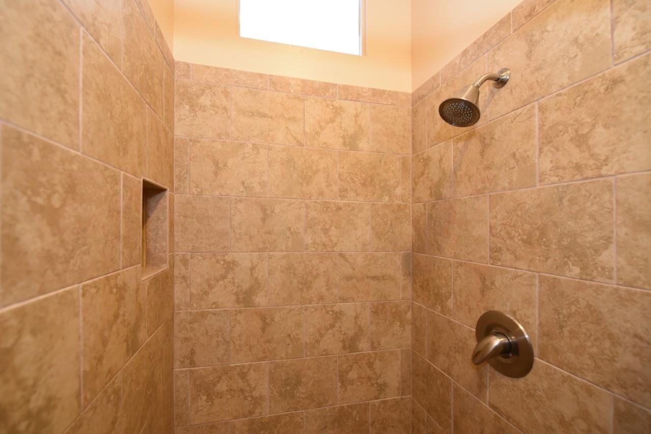 4909 Lower Honoapiilani Road, Unit E4 Lahaina, HI 96761 - Photo 18 of 30 a bathroom with a shower