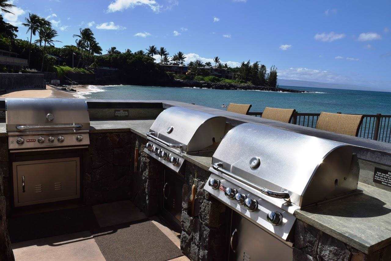4909 Lower Honoapiilani Road, Unit E4 Lahaina, HI 96761 - Photo 21 of 30 a view of a couches with wooden floor
