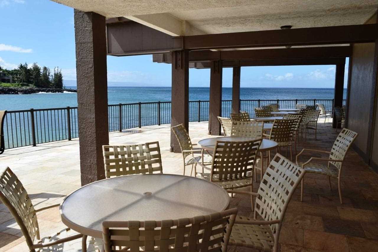 4909 Lower Honoapiilani Road, Unit E4 Lahaina, HI 96761 - Photo 22 of 30 a outdoor dining space with furniture and outdoor view