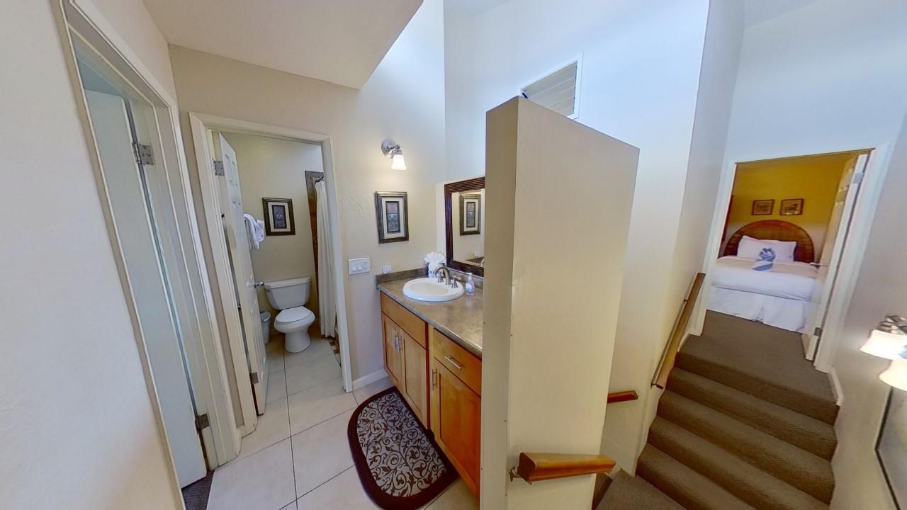 4909 Lower Honoapiilani Road, Unit E4 Lahaina, HI 96761 - Photo 8 of 30 a bathroom with a sink a toilet and shower