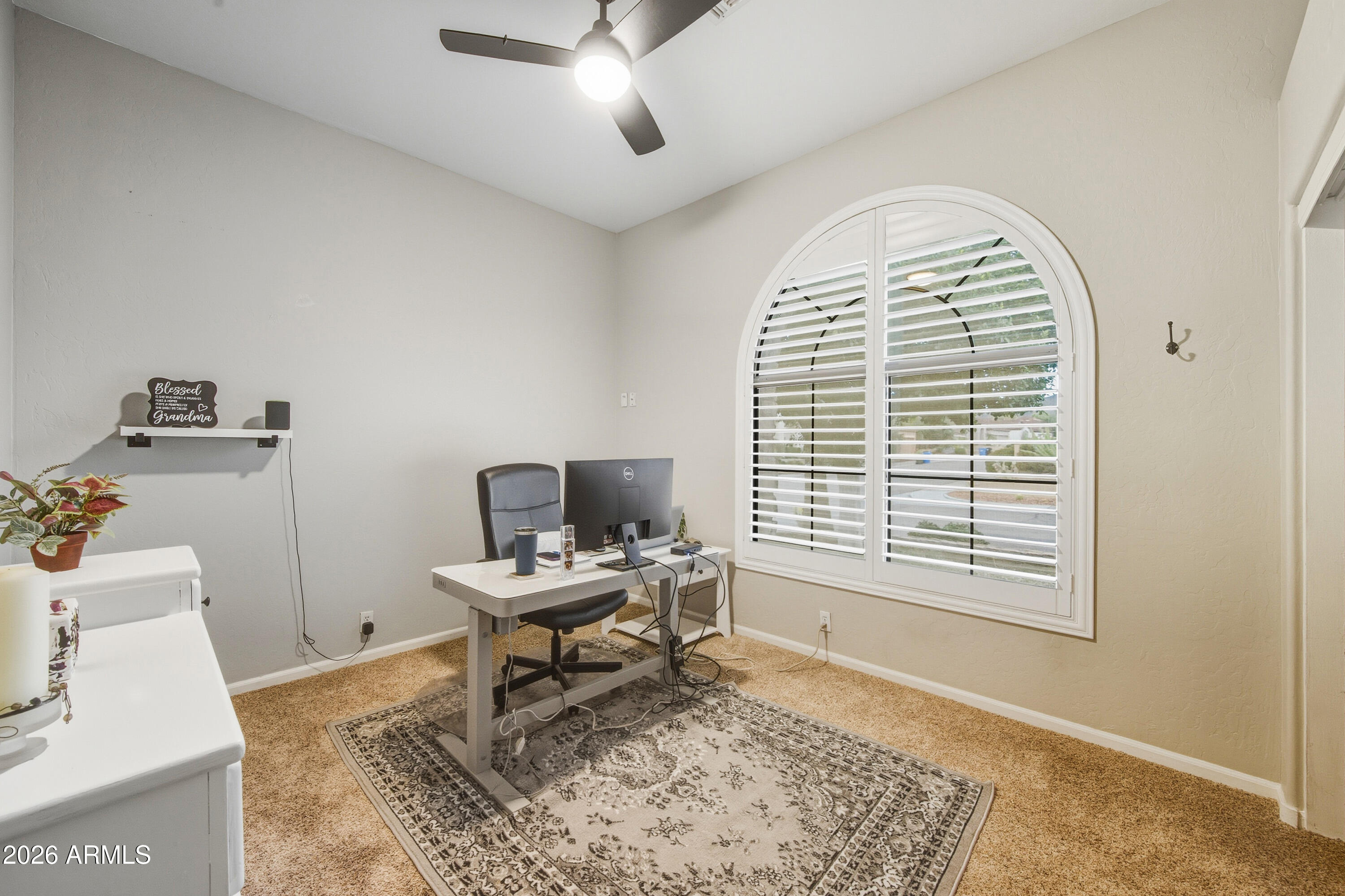 16635 South 12th Avenue Phoenix, AZ 85045 - Photo 26 of 43 a view of a livingroom with workspace and a window