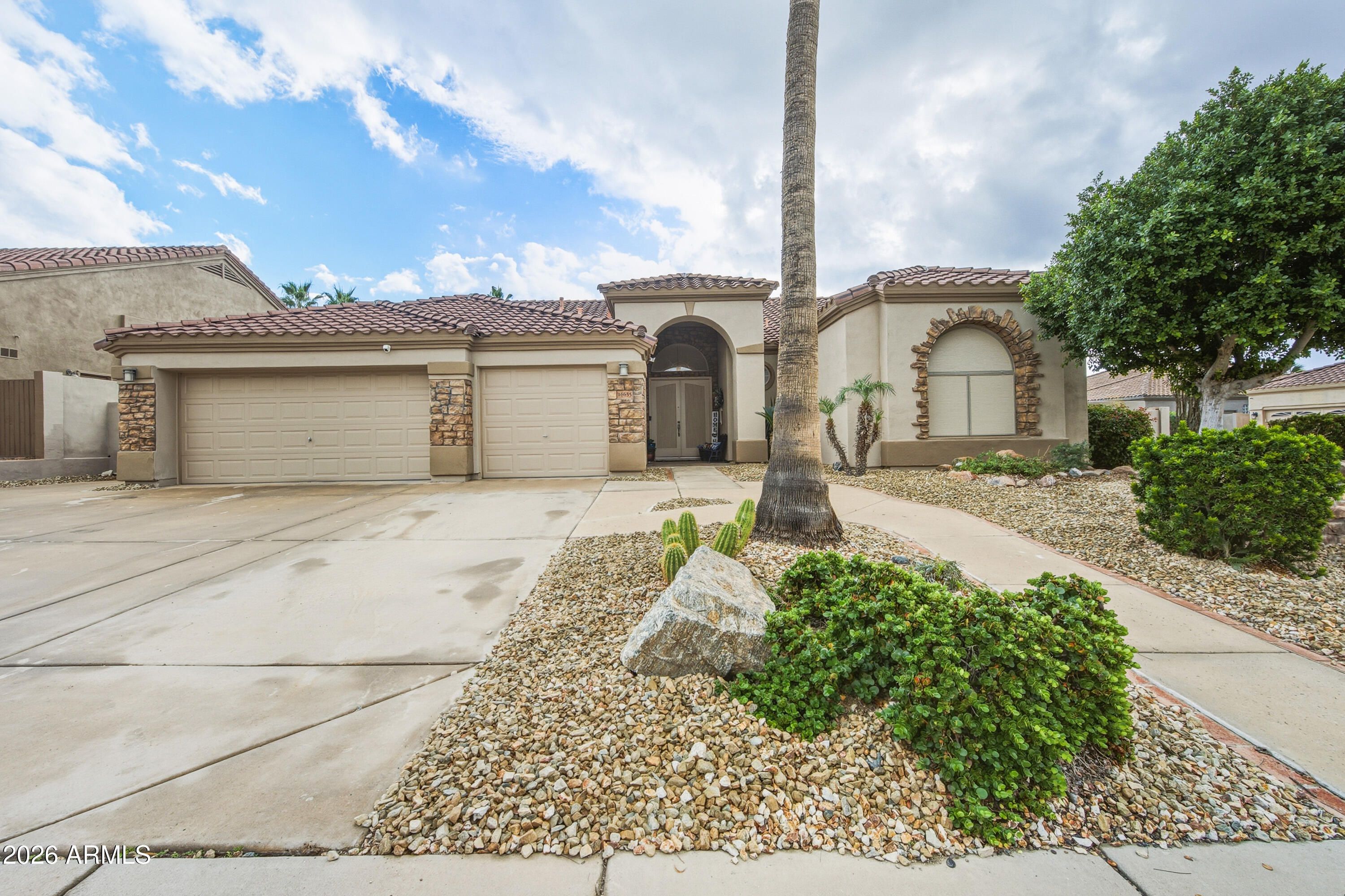 16635 South 12th Avenue Phoenix, AZ 85045 - Photo 2 of 43 a view of a house with a yard