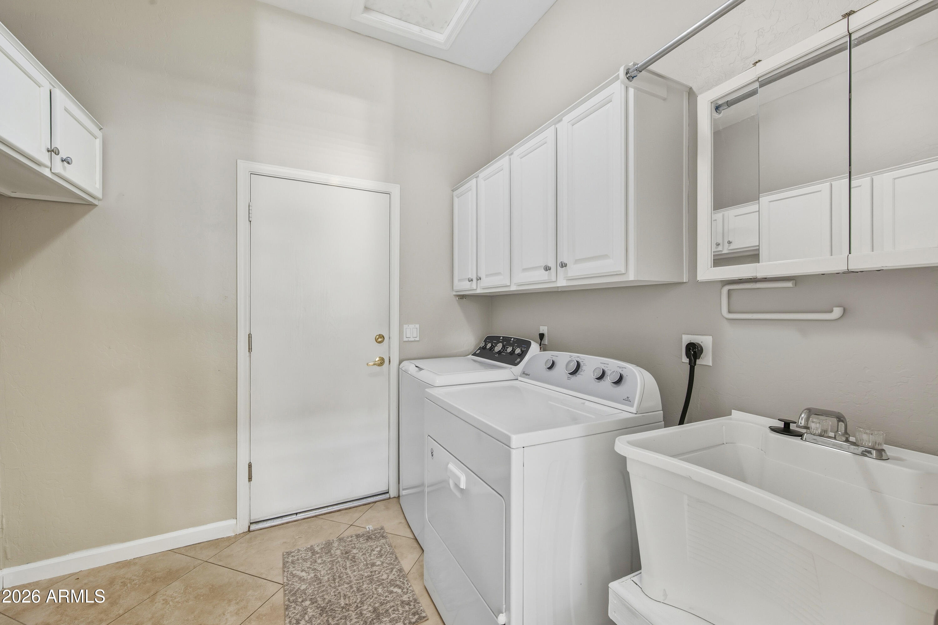 16635 South 12th Avenue Phoenix, AZ 85045 - Photo 31 of 43 a utility room with dryer and washer