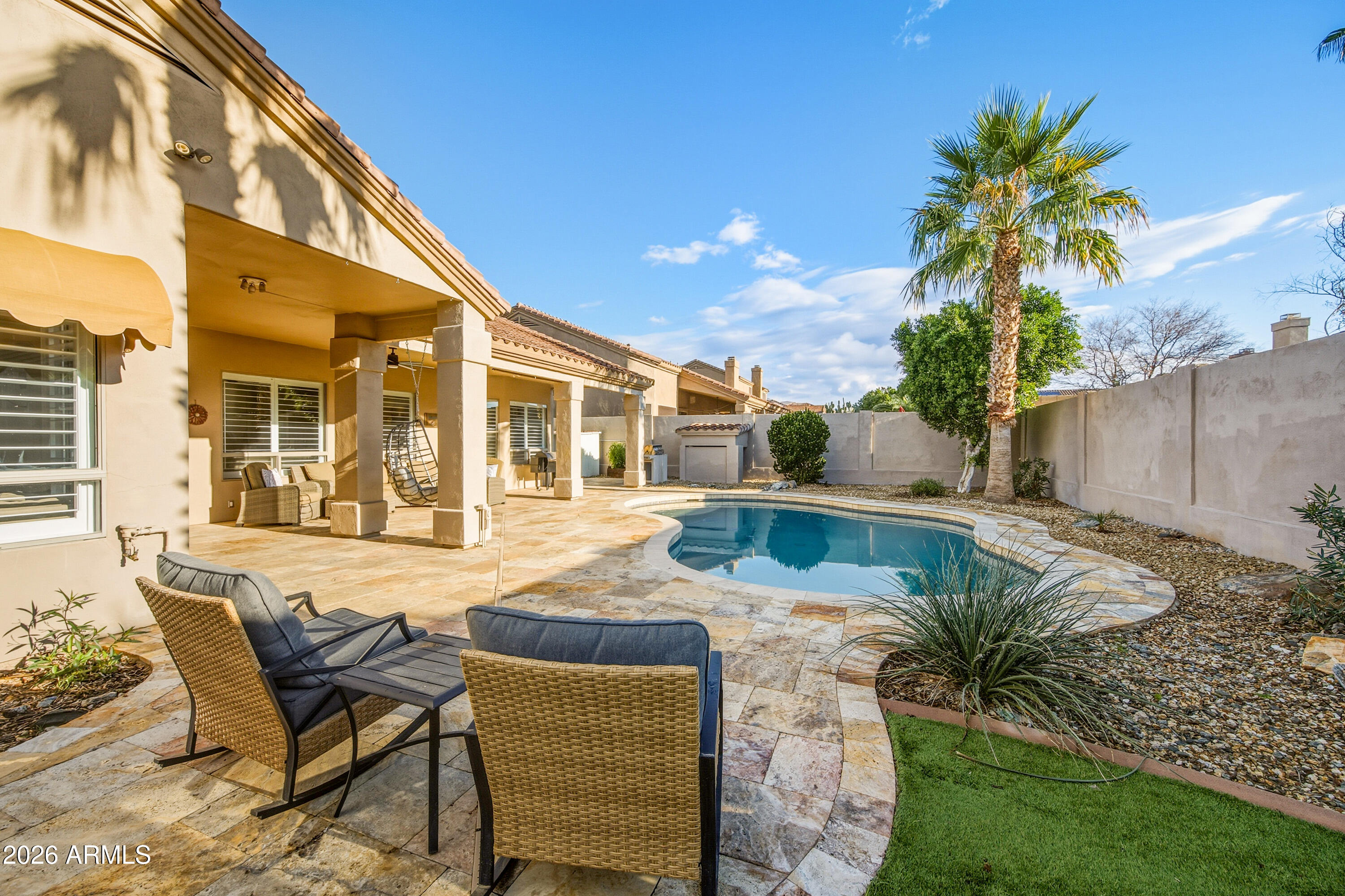 16635 South 12th Avenue Phoenix, AZ 85045 - Photo 35 of 43 a view of a house with backyard and sitting area