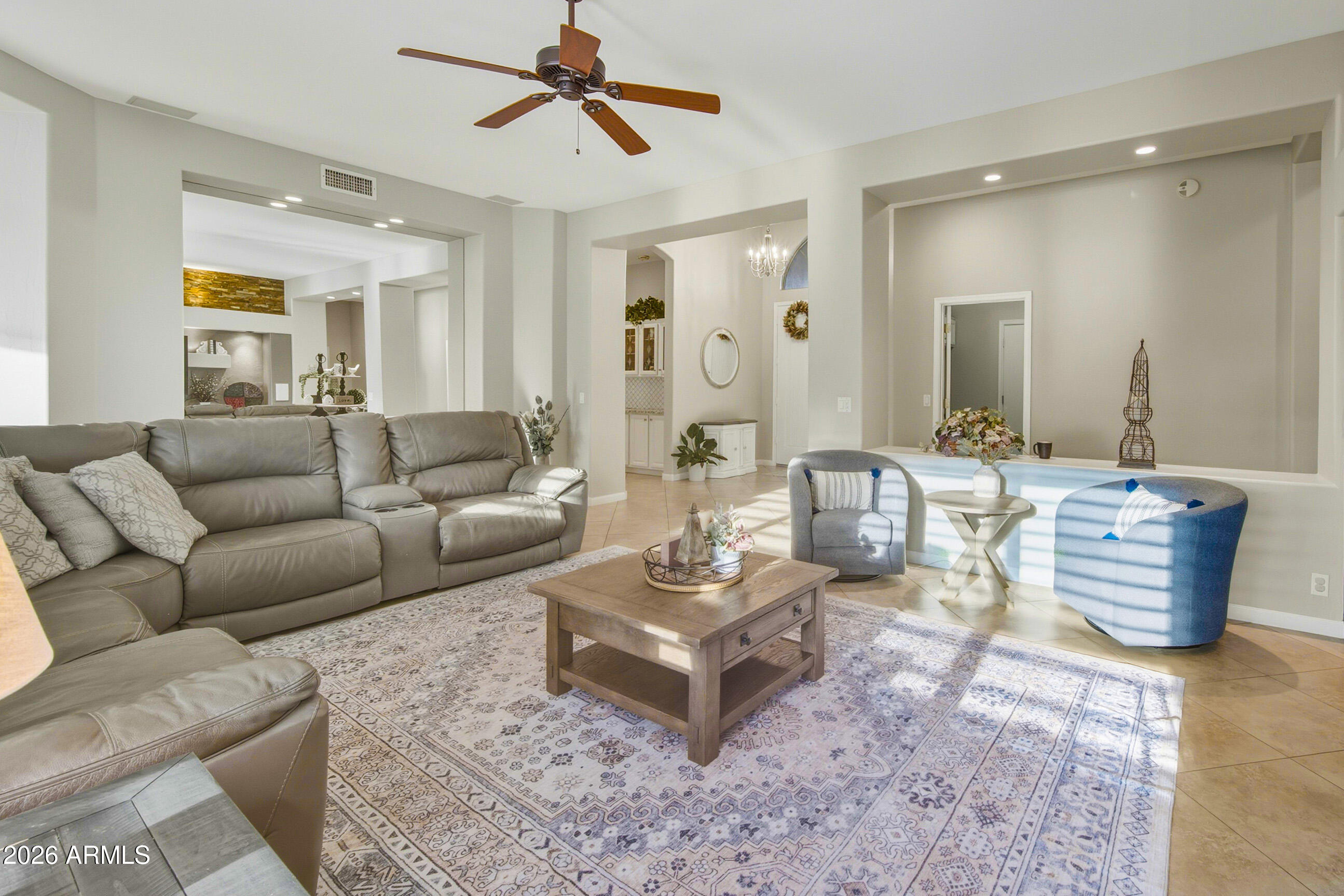 16635 South 12th Avenue Phoenix, AZ 85045 - Photo 8 of 43 a living room with furniture and wooden floor