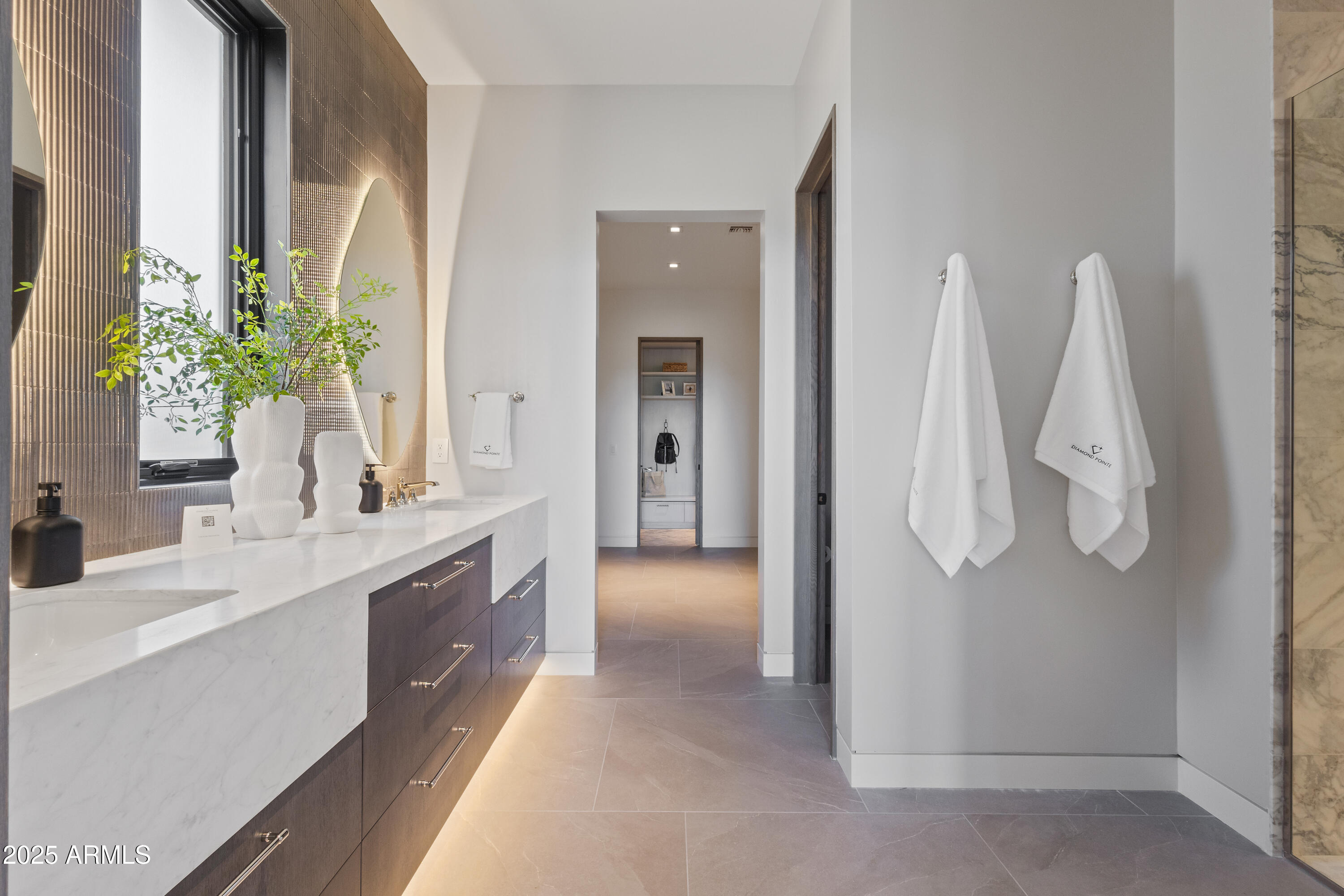 106 South Rim Club Drive Payson, AZ 85541 - Photo 17 of 49 a bathroom with a double vanity sink and a mirror