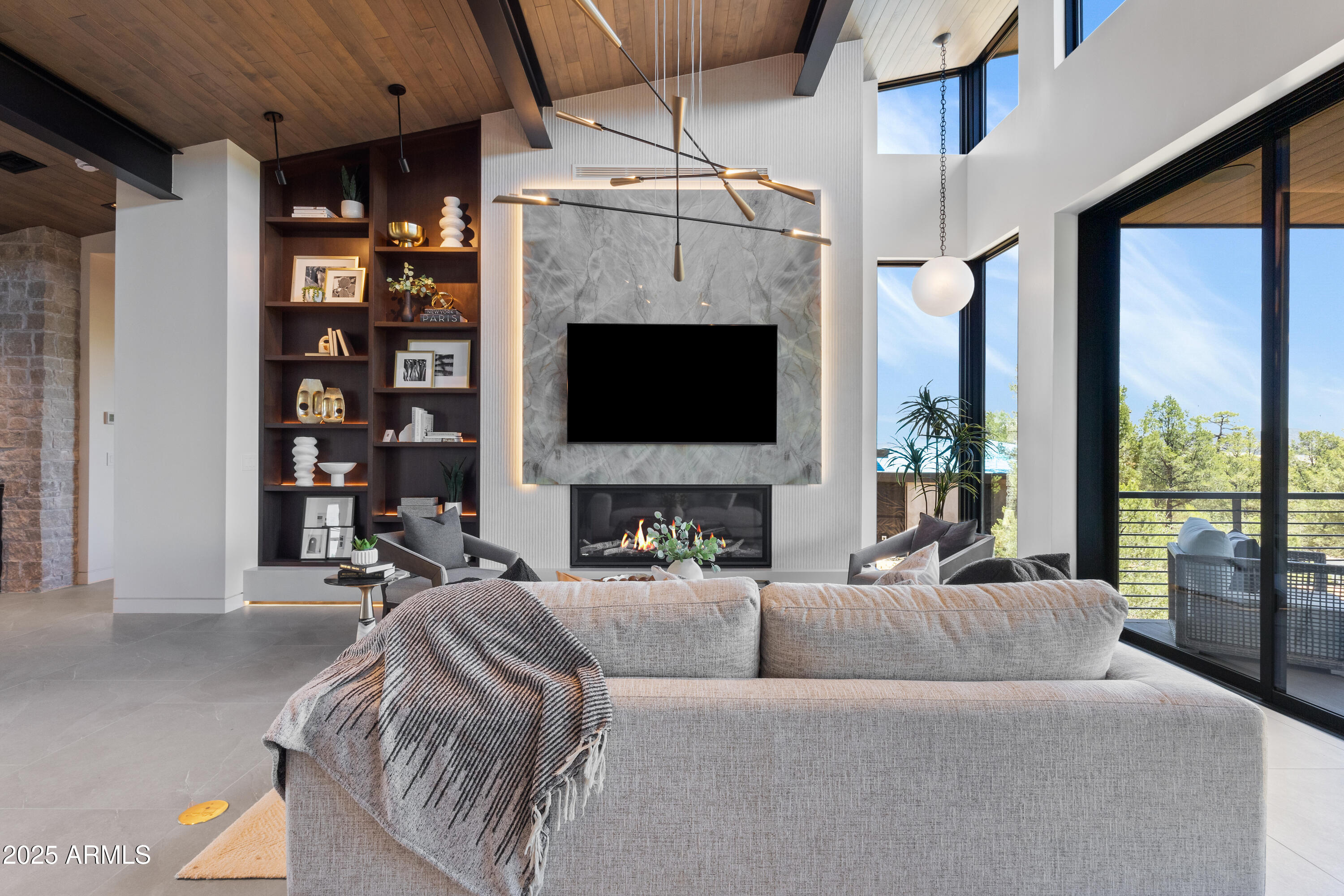 106 South Rim Club Drive Payson, AZ 85541 - Photo 5 of 49 a living room with furniture a fireplace and a flat screen tv