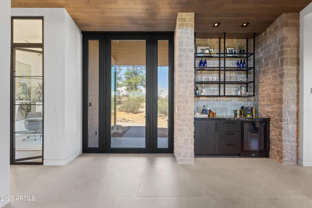 wooden floor in an empty room and a window