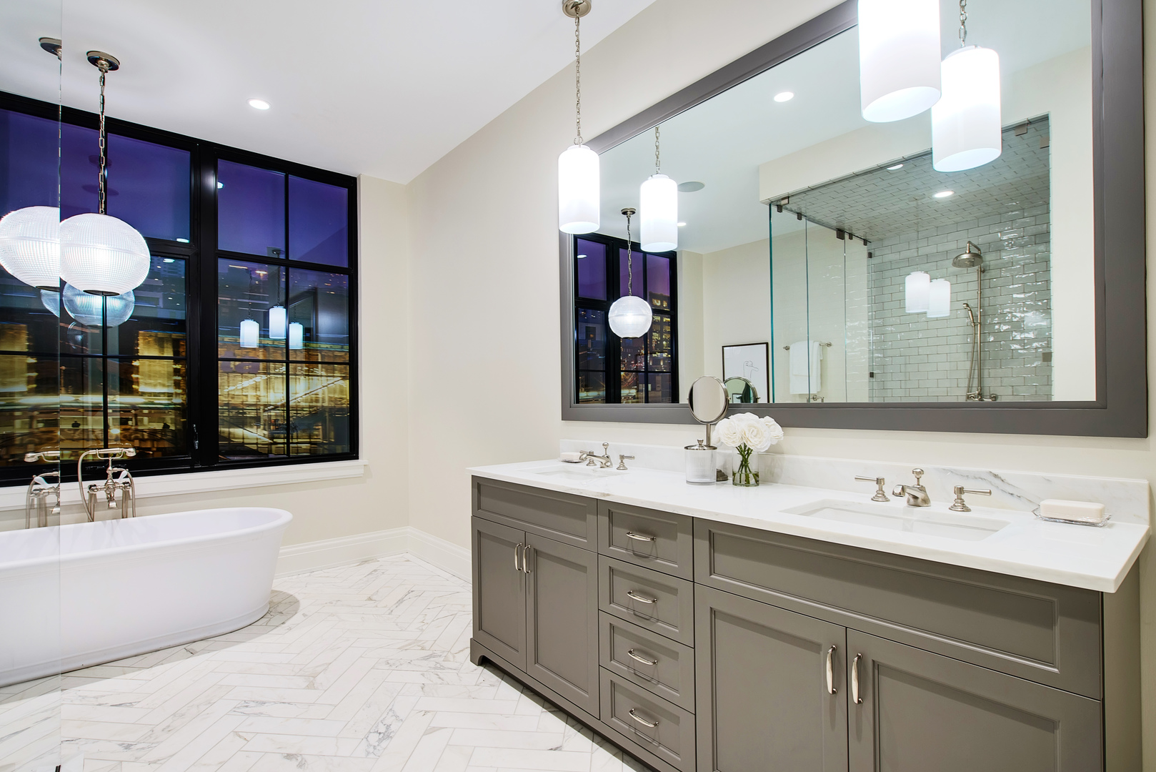 1109 West Washington Boulevard, Unit PH8C Chicago, IL 60607 - Photo 15 of 24 a bathroom with a tub sink and mirror