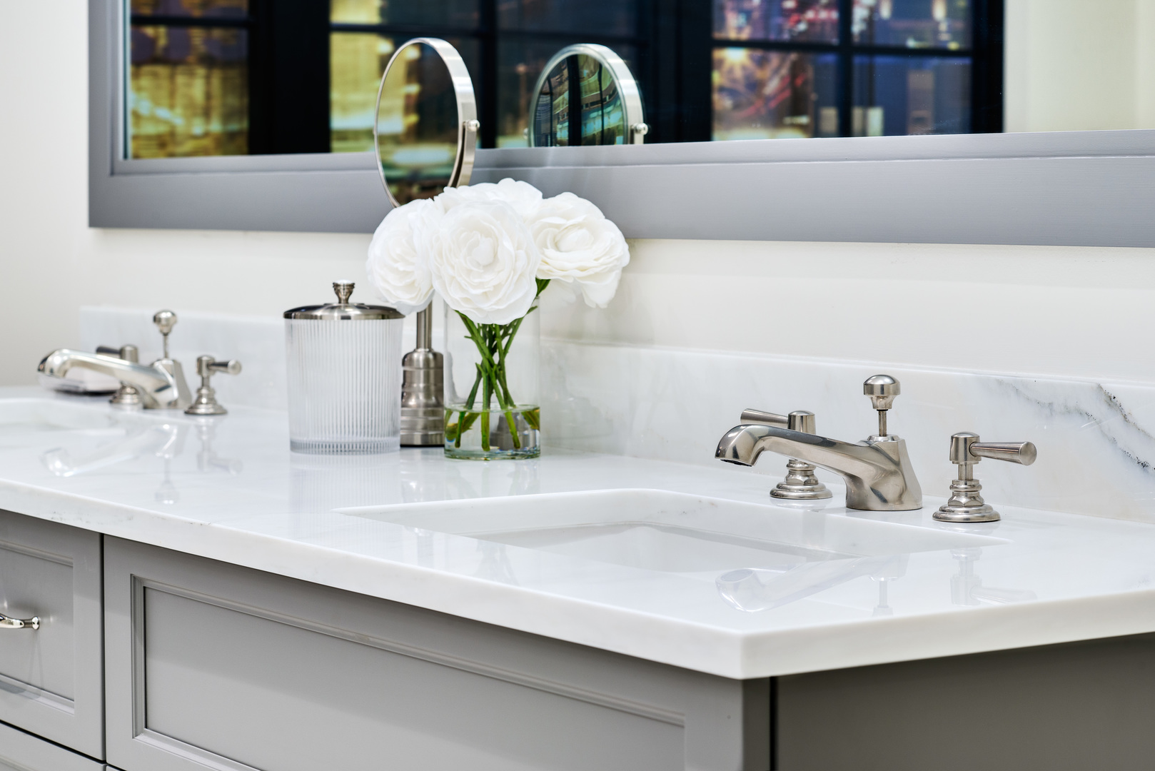 1109 West Washington Boulevard, Unit PH8C Chicago, IL 60607 - Photo 9 of 24 a bathroom sink with a mirror