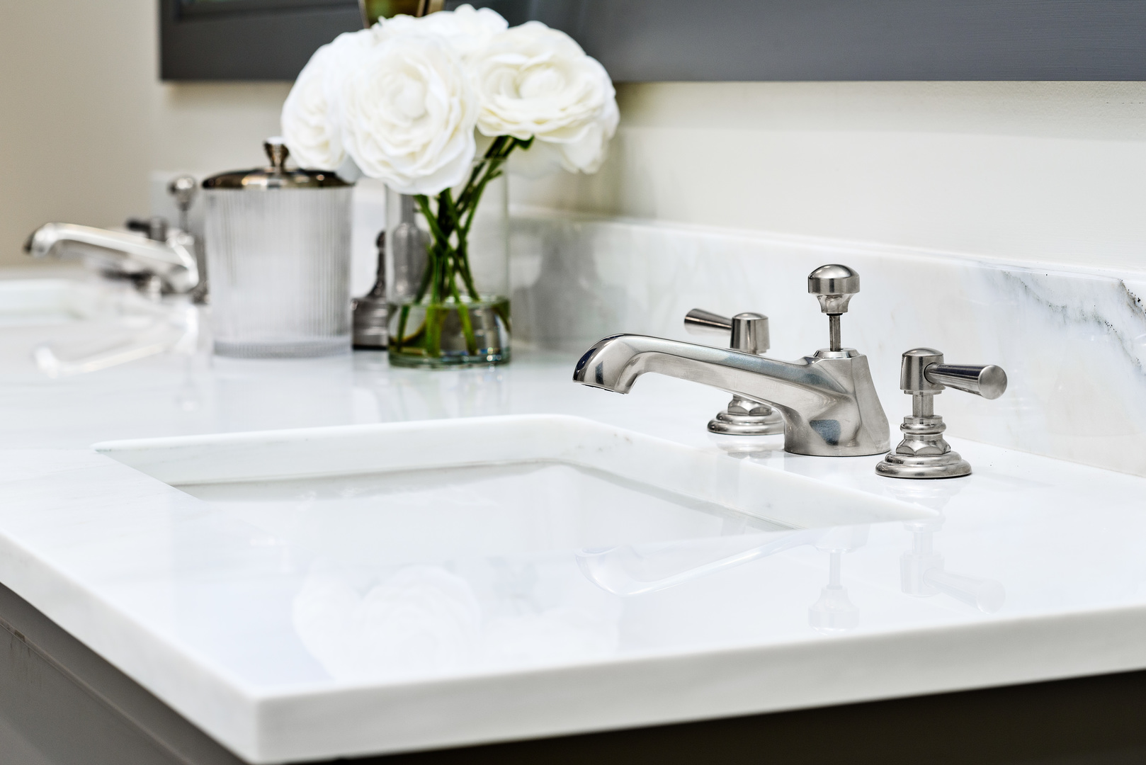 1109 West Washington Boulevard, Unit PH8C Chicago, IL 60607 - Photo 10 of 24 a bathroom with a sink and a mirror
