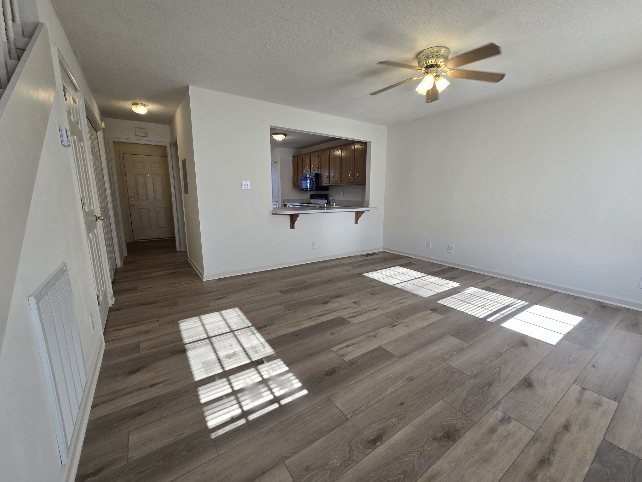 223 Tree Line Drive Oak Grove, KY 42262 - Photo 9 of 18 wooden floor in an empty room with a mirror