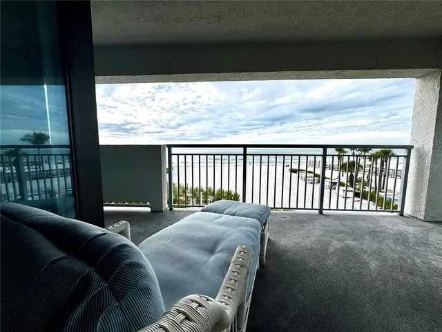 a balcony with a couch