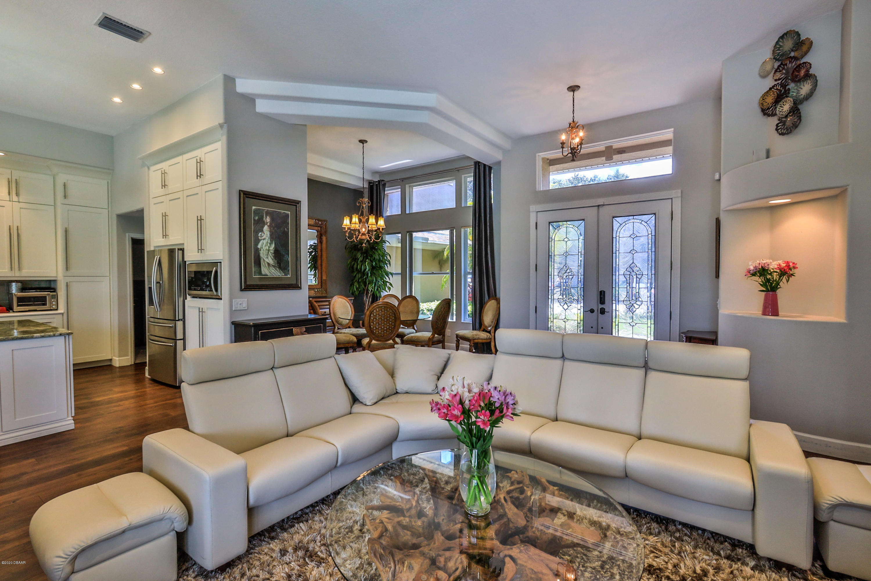 5 Creek Branch Way Ormond Beach, FL 32174 - Photo 12 of 42 a living room with furniture and a chandelier