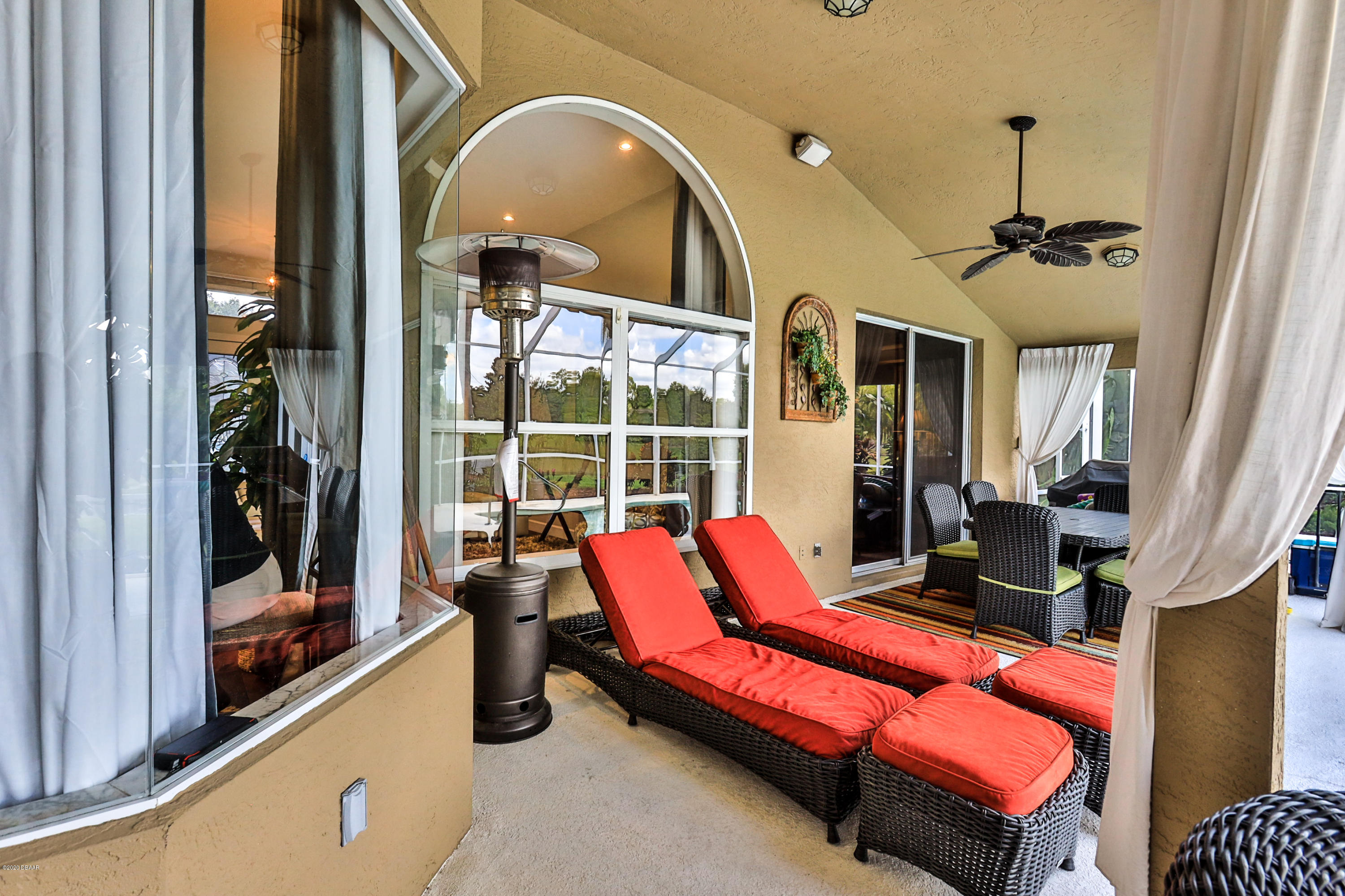 5 Creek Branch Way Ormond Beach, FL 32174 - Photo 27 of 42 a living room with blue lights with furniture
