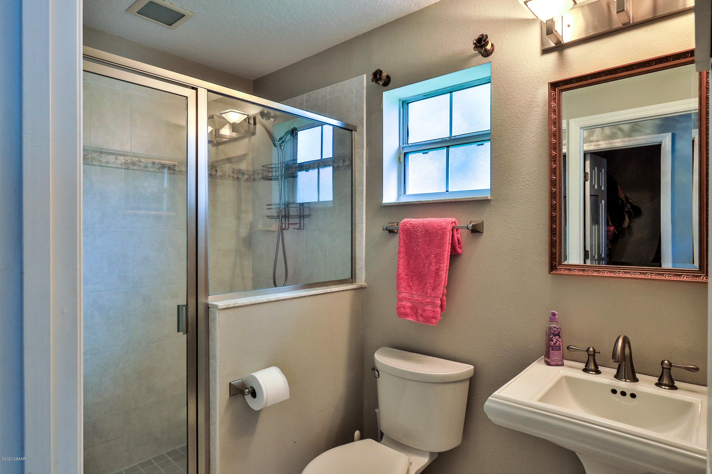 5 Creek Branch Way Ormond Beach, FL 32174 - Photo 36 of 42 a bathroom with a sink toilet and shower