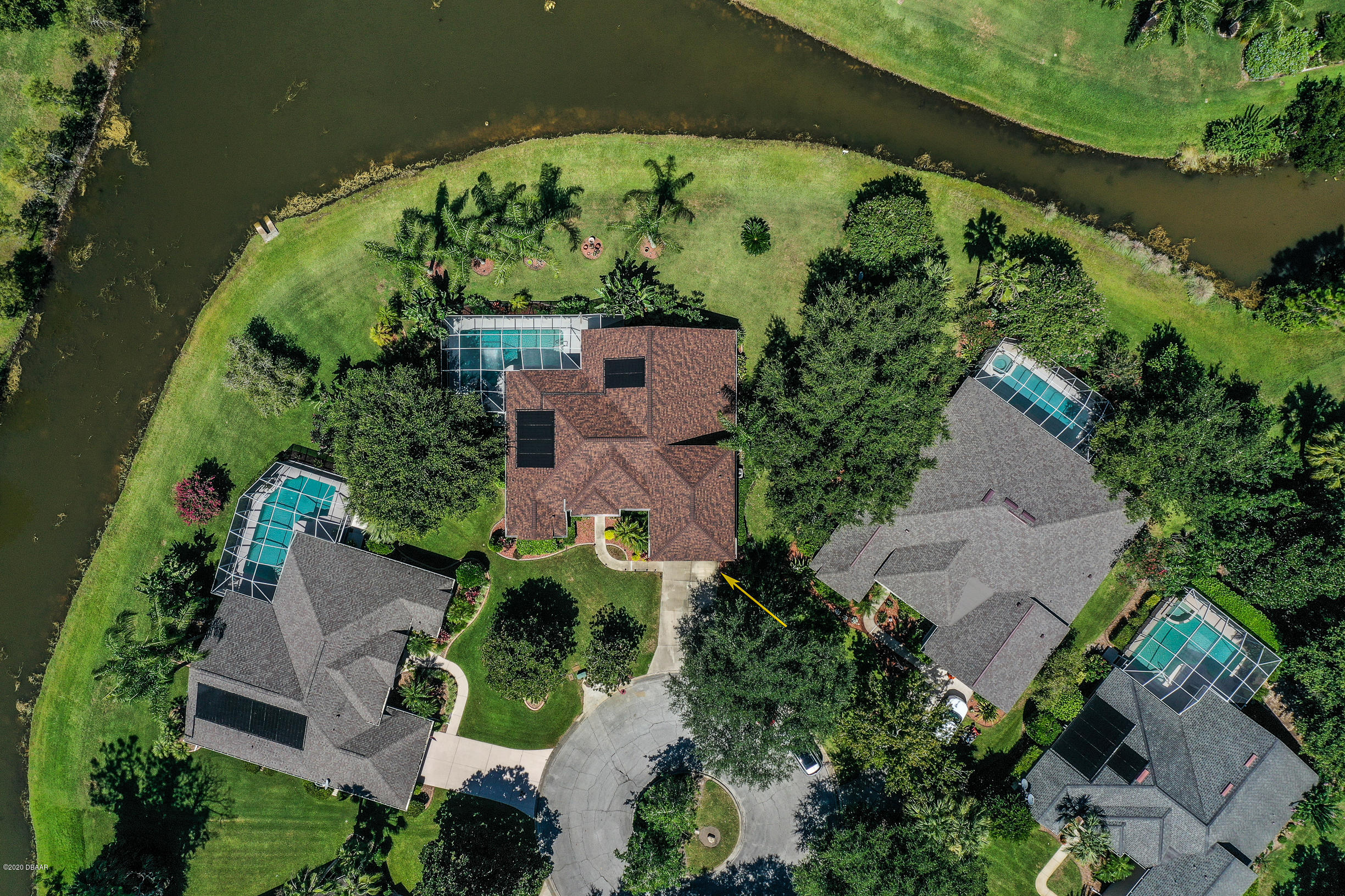 5 Creek Branch Way Ormond Beach, FL 32174 - Photo 40 of 42 an aerial view of a house with a yard and green space