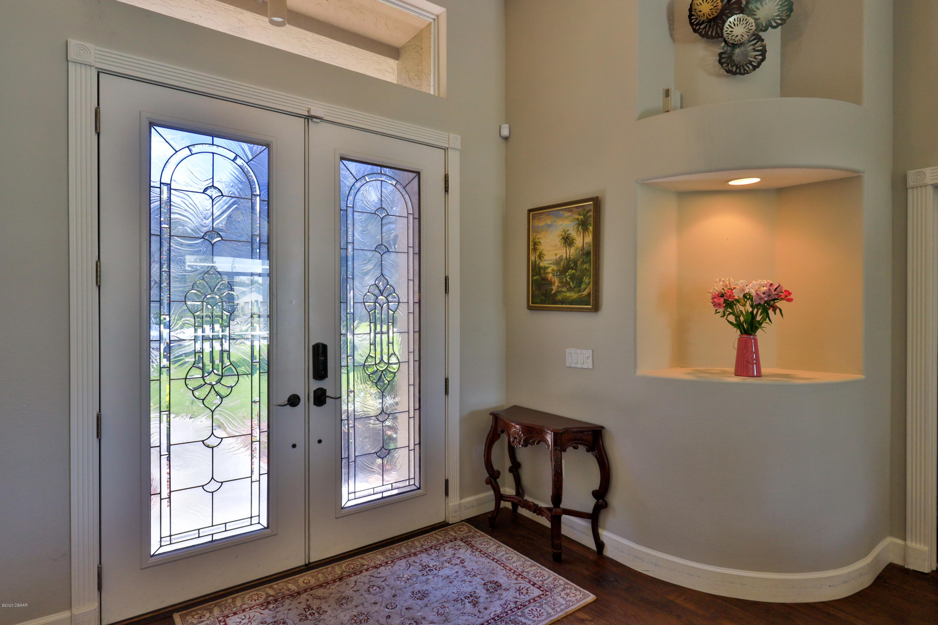 5 Creek Branch Way Ormond Beach, FL 32174 - Photo 8 of 42 a view of a hallway with workspace and windows