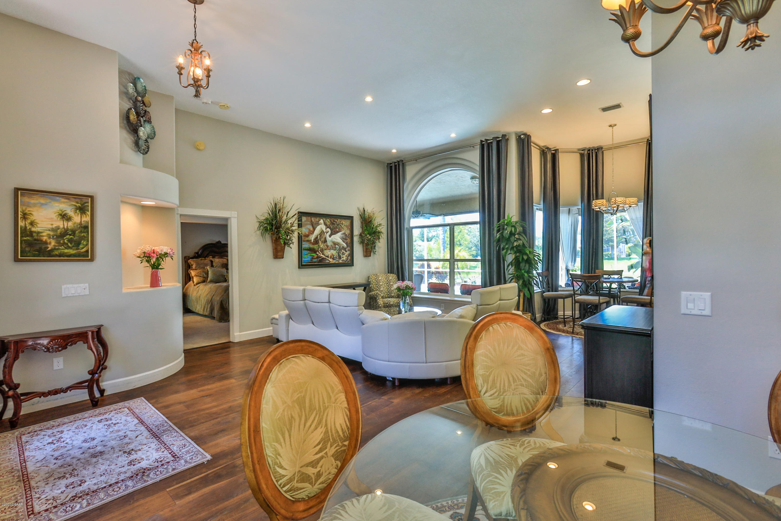 5 Creek Branch Way Ormond Beach, FL 32174 - Photo 10 of 42 a living room with fireplace furniture and a large window