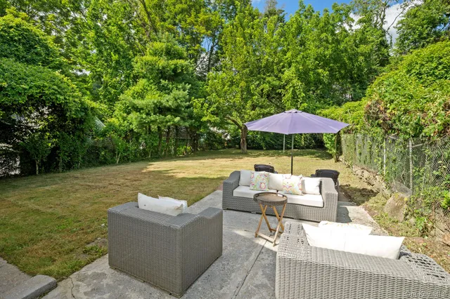 a view of pool with outdoor seating