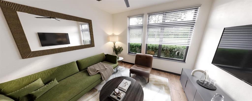 1881 2nd Avenue, Unit 4303 Decatur, GA 30032 - Photo 3 of 27 a living room with furniture and a flat screen tv