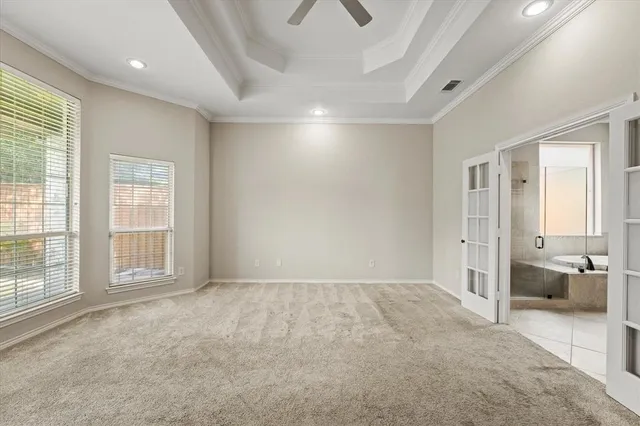 a large bathroom with a granite countertop tub sink a mirror and a shower