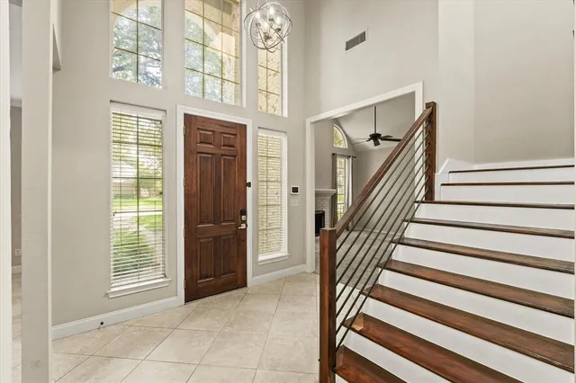 a view of an entryway with staircase