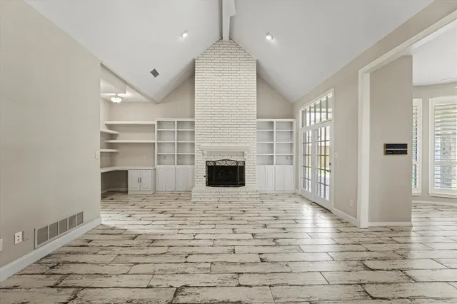 a view of a livingroom with a fireplace