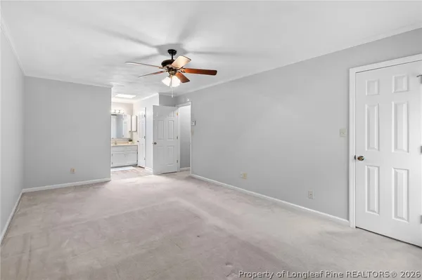 a view of empty room with fan