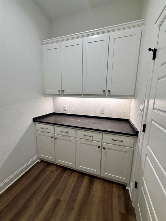 10400 T T Bury Lane Waco, TX 76708 - Photo 8 of 22 a view of a kitchen with cabinets