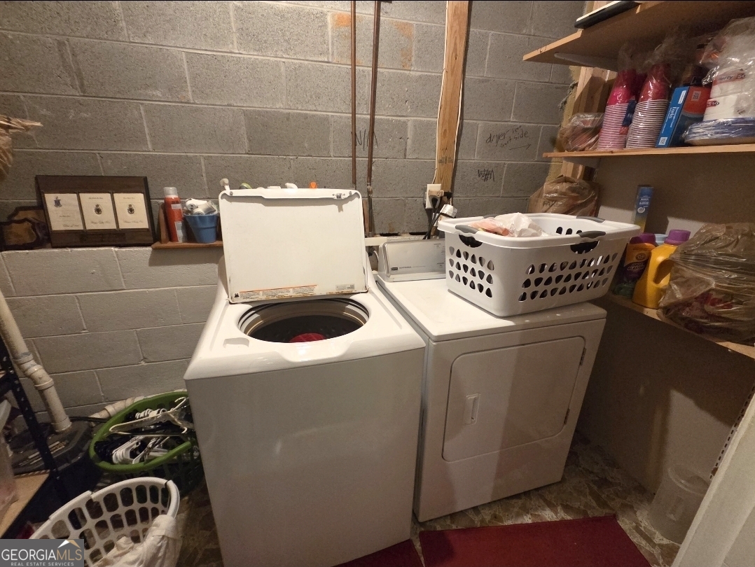 21 Baskin Heights Path Temple, GA 30179 - Photo 32 of 44 a utility room with dryer and washer