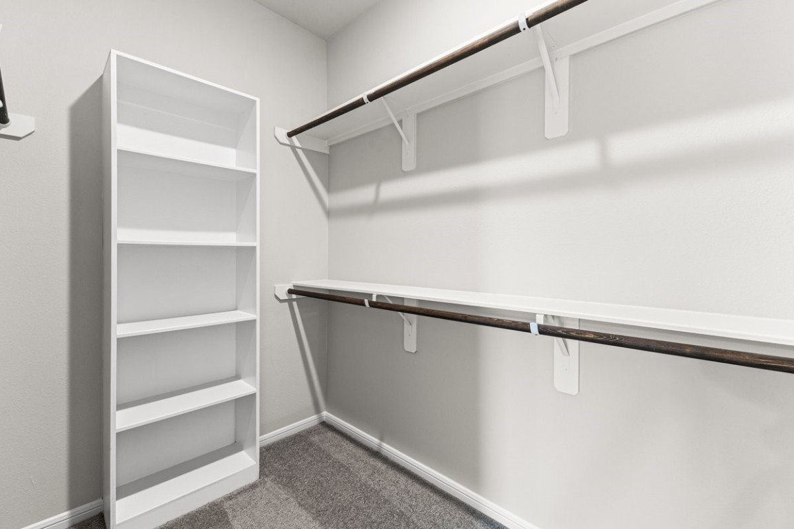 10139 Red Snapper Road Magnolia, TX 77354 - Photo 19 of 27 a view of an empty walk in closet