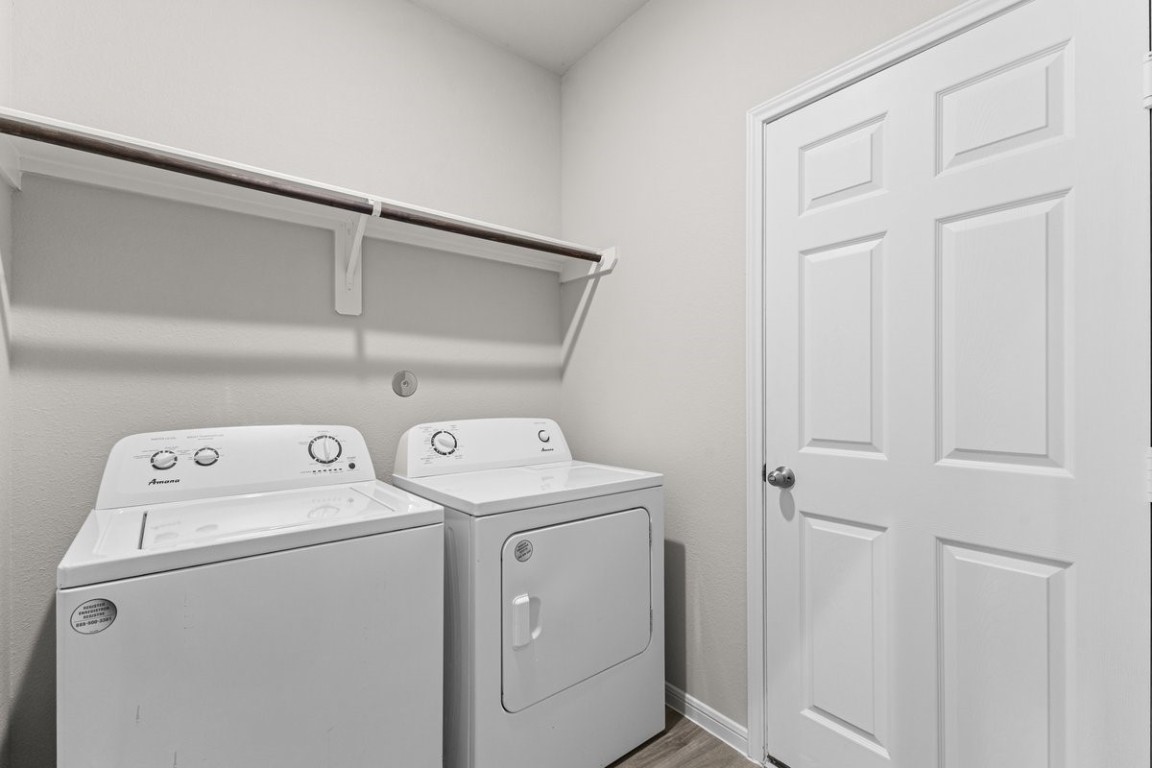 10139 Red Snapper Road Magnolia, TX 77354 - Photo 20 of 27 a utility room with dryer and washer