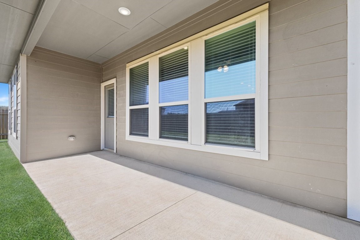 10139 Red Snapper Road Magnolia, TX 77354 - Photo 23 of 27 a view of an empty room with a window