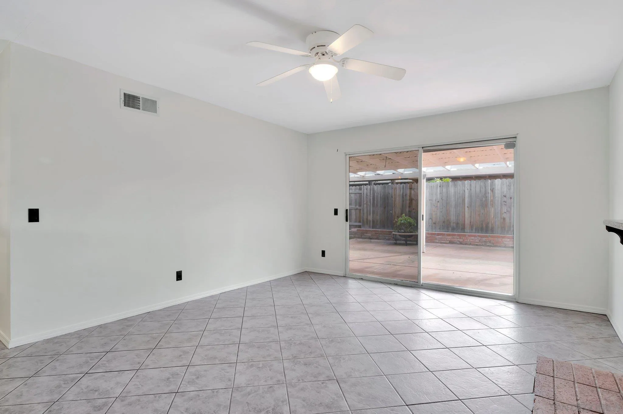 9183 Via De Amor Santee, CA 92071 - Photo 11 of 32 a view of an empty room with a window