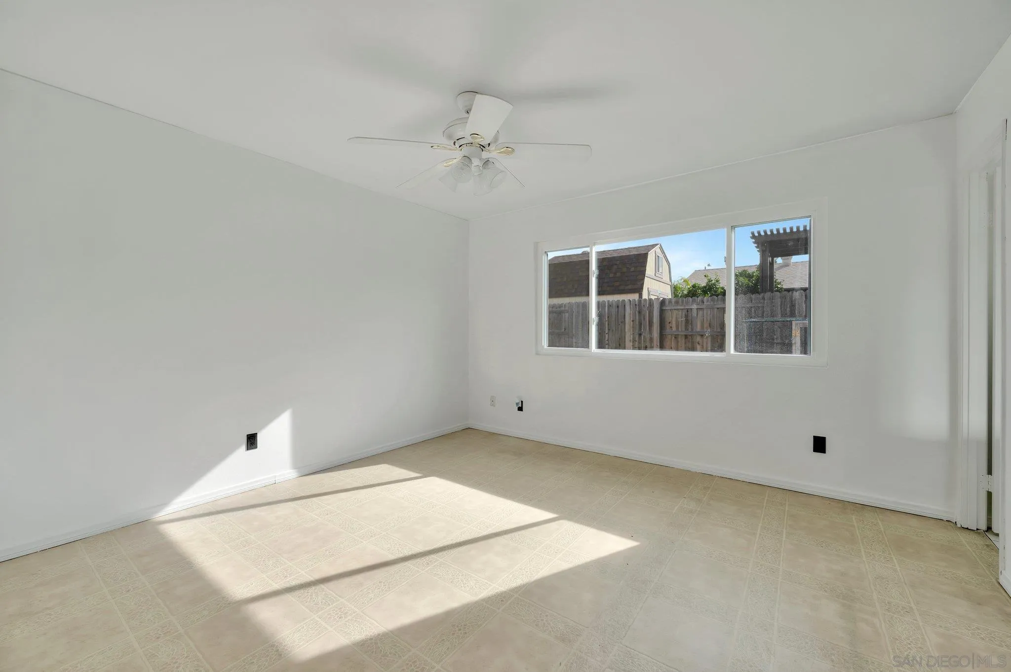 9183 Via De Amor Santee, CA 92071 - Photo 13 of 32 a view of an empty room with a window