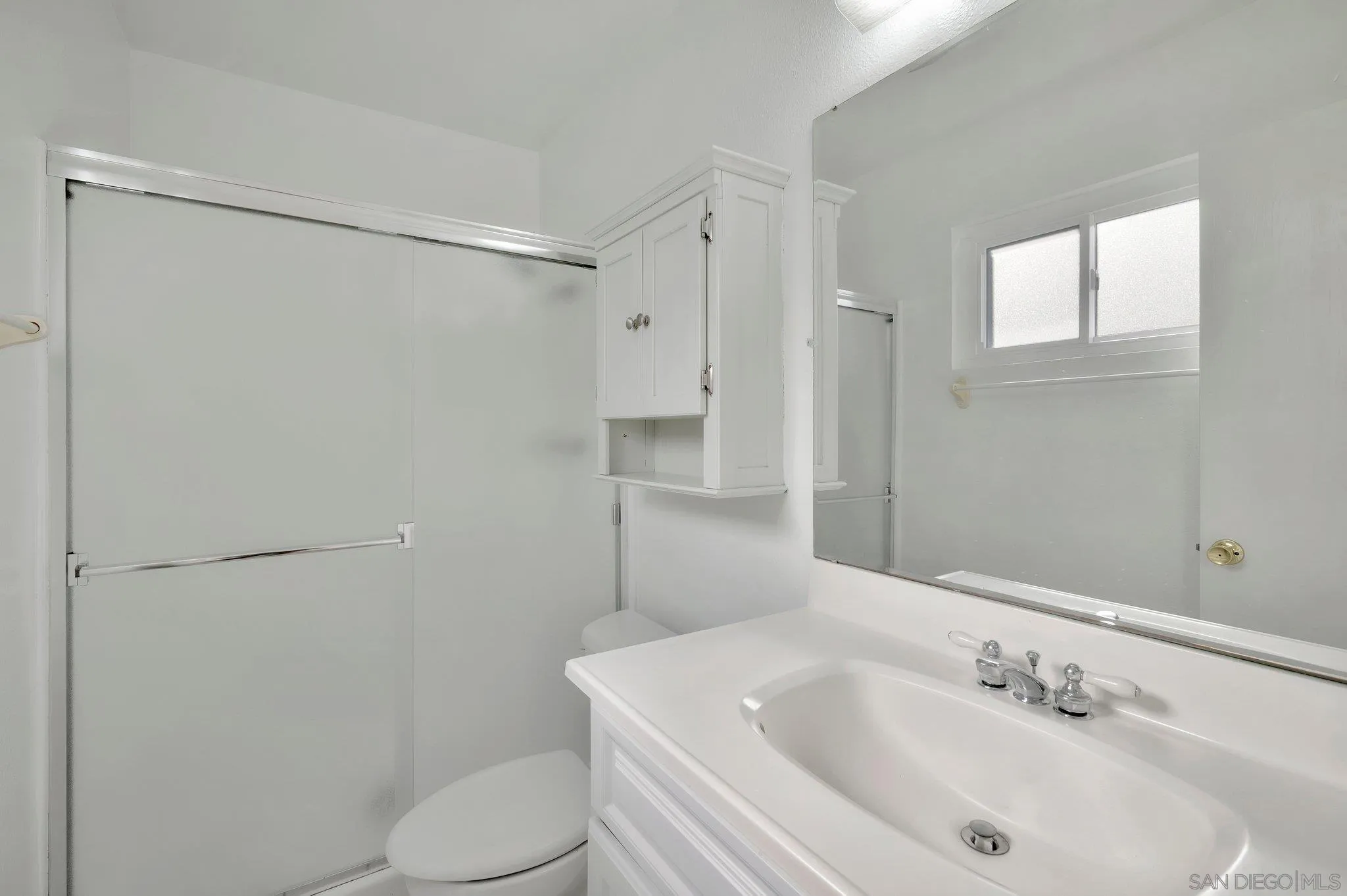 9183 Via De Amor Santee, CA 92071 - Photo 16 of 32 a bathroom with a sink toilet and shower