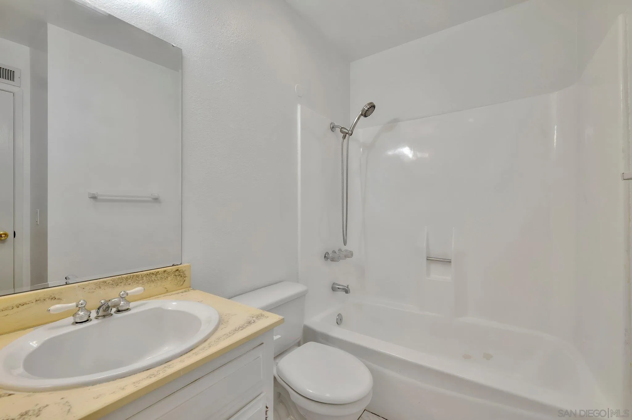 9183 Via De Amor Santee, CA 92071 - Photo 19 of 32 a bathroom with a sink toilet and shower