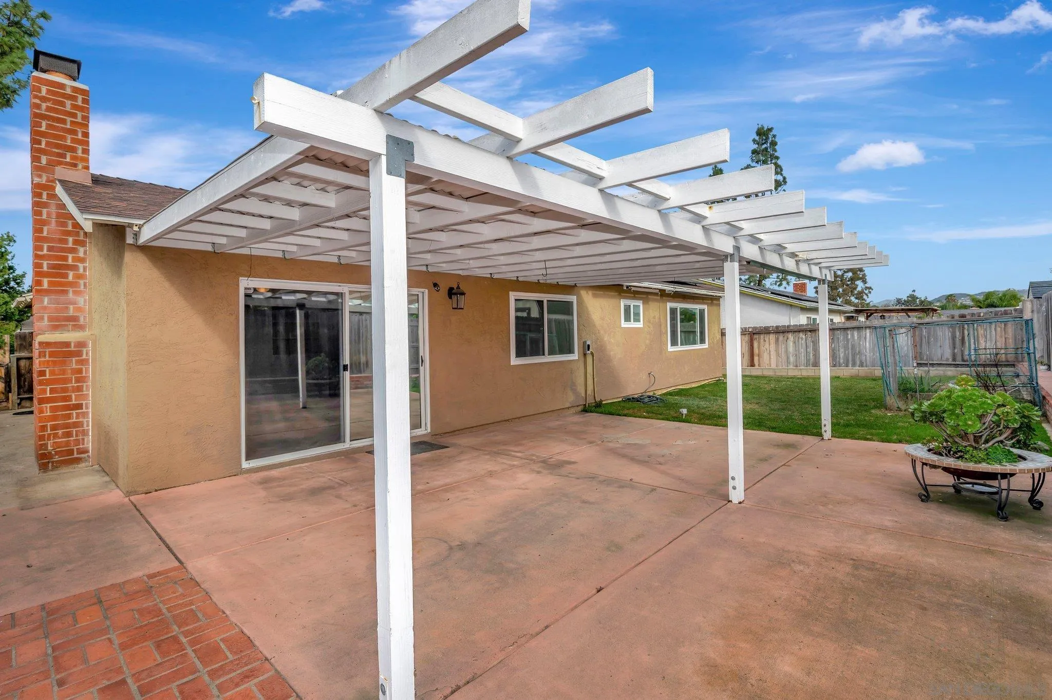 9183 Via De Amor Santee, CA 92071 - Photo 25 of 32 a view of an house with backyard and porch