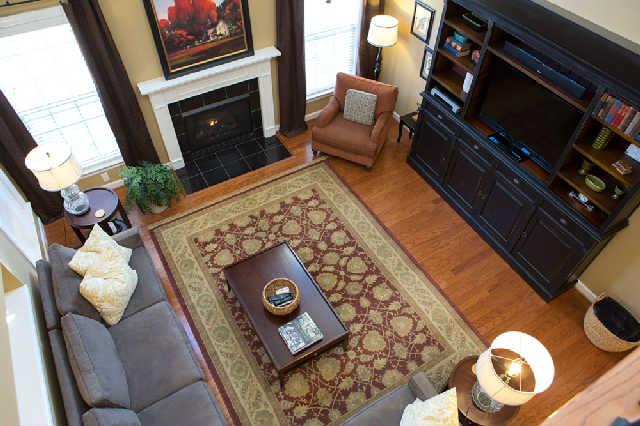 5524 Rathkeale Lane Franklin, TN 37067 - Photo 8 of 20 View from upstairs of the awesome two story Family Room. Floor to ceiling windows are impressive, combined with the workmanship of the extensive crown moldings and trim, truly make this room a showplace.